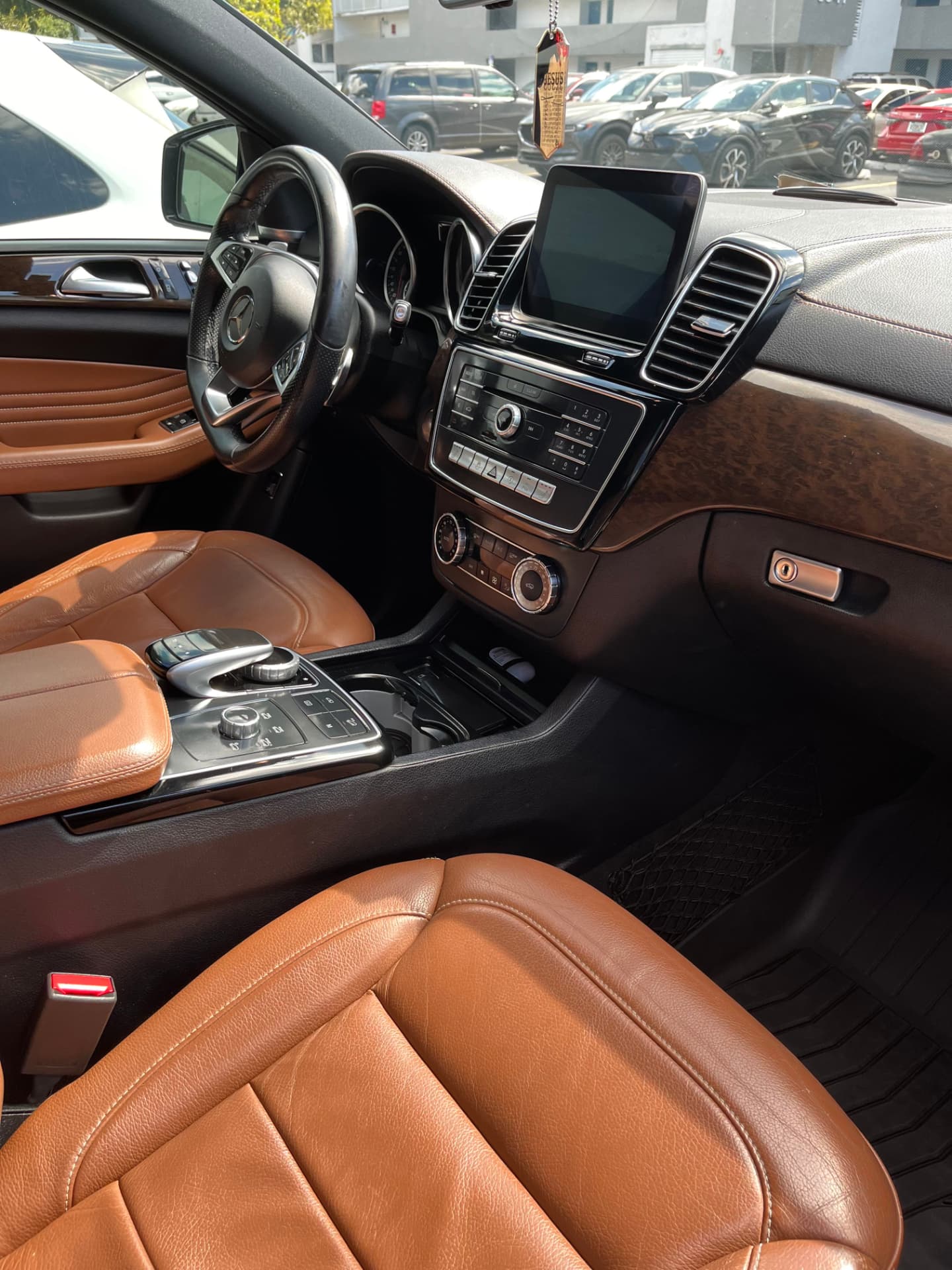 Tan leather interior conditioned, console and mats spotless
