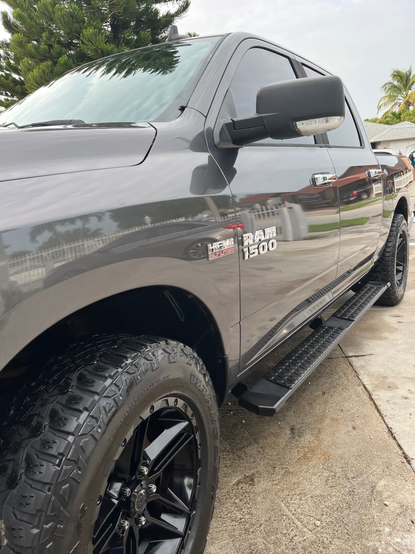 Gray pickup side profile with mirror-reflective paint