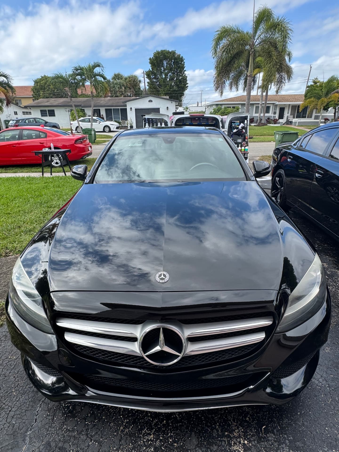 Hood reflecting the sky after a fresh polish